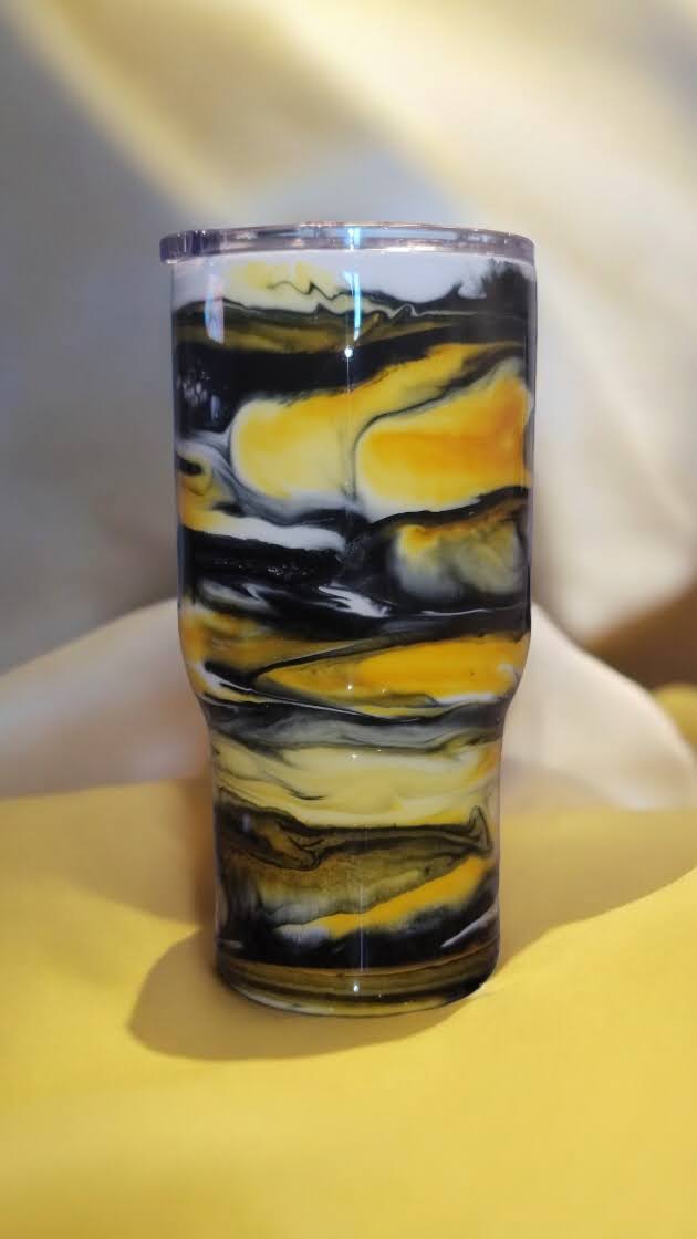 Black and yellow 22 oz tumbler with lid and metal straw