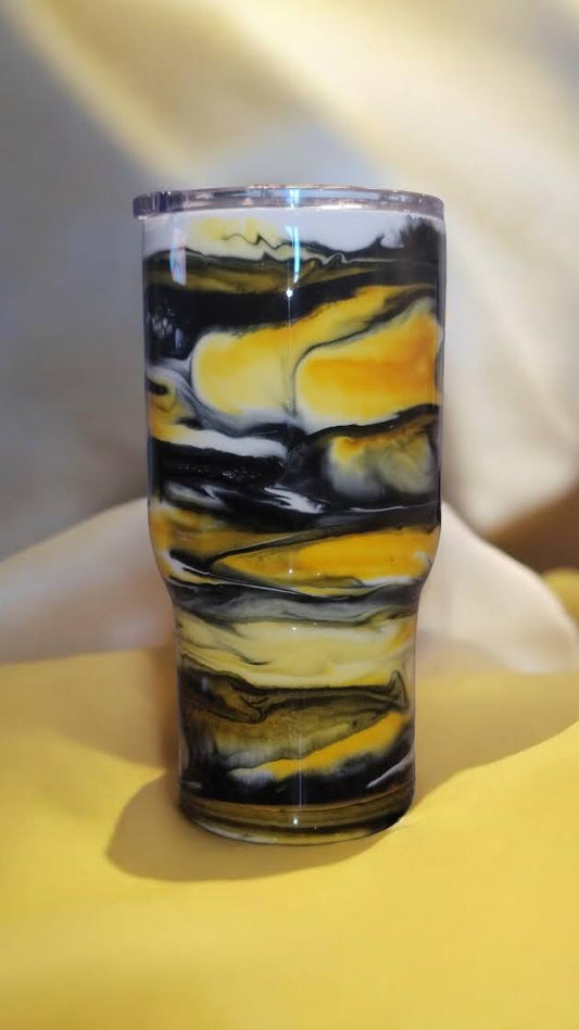 Black and yellow 22 oz tumbler with lid and metal straw